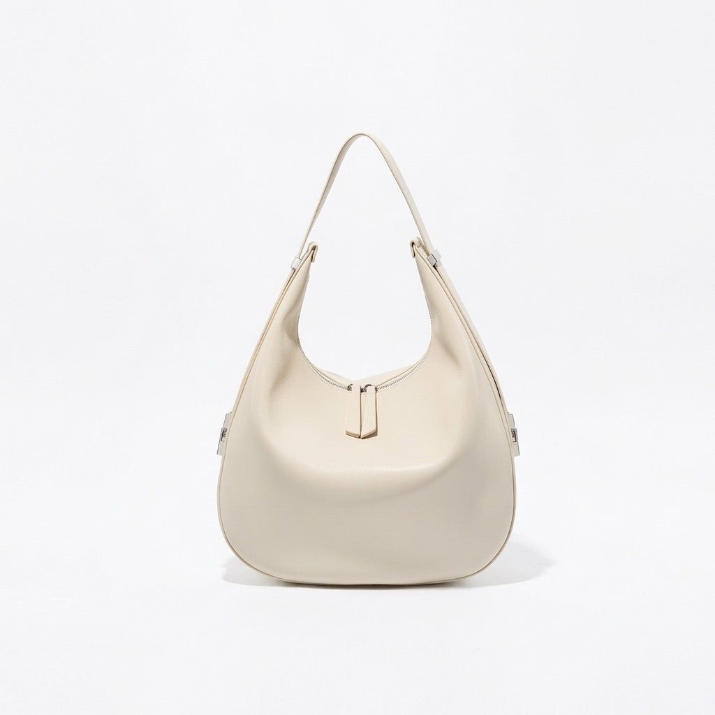 Borsa a tracolla a mezzaluna minimalista in vera pelle