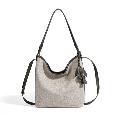 Slouchy Canvas Bucket Clutch Bag with Tassel Charm