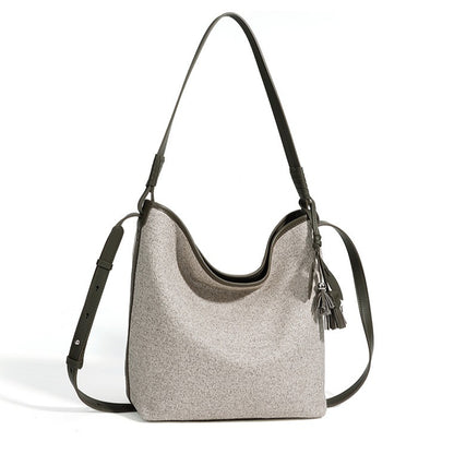 Slouchy Canvas Bucket Clutch Bag with Tassel Charm