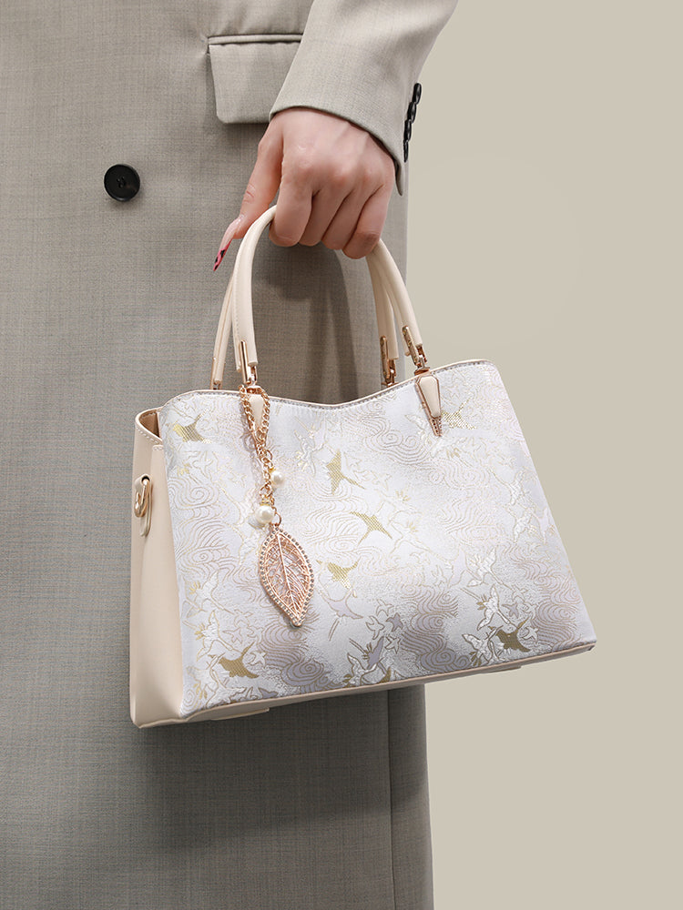 Sophisticated Oriental Jacquard Vegan Eco‑Leather Clutch Bag with Leaf Charm