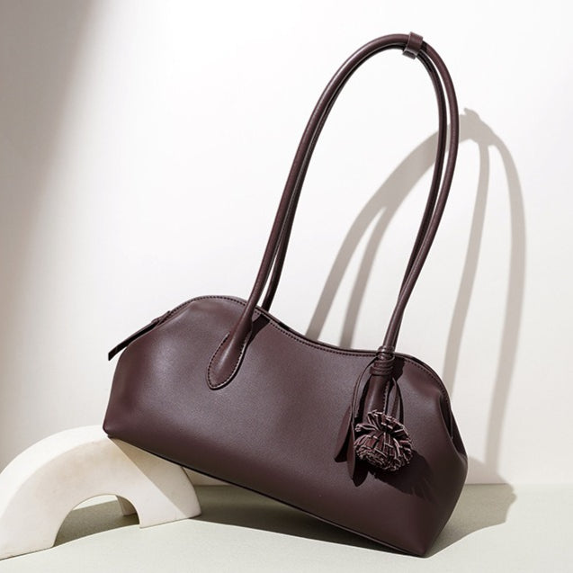 Minimalist Supple Genuine Leather Curved Clutch Bag with Playful Charm