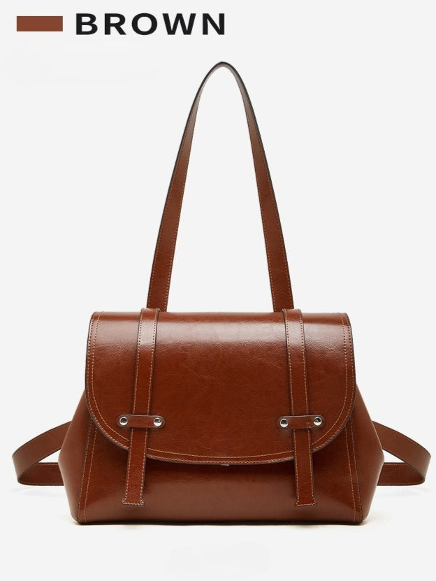 The Oil-Waxed Genuine Leather Convertible Flap Backpack Shoulder Bag