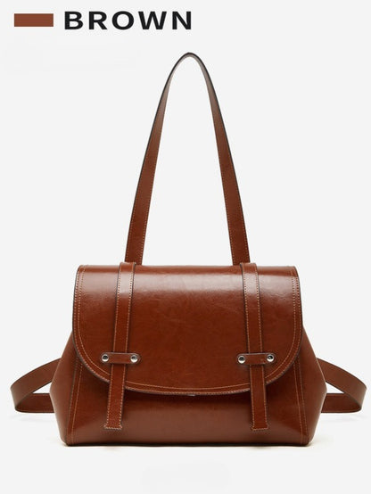 The Oil-Waxed Genuine Leather Convertible Flap Backpack Shoulder Bag