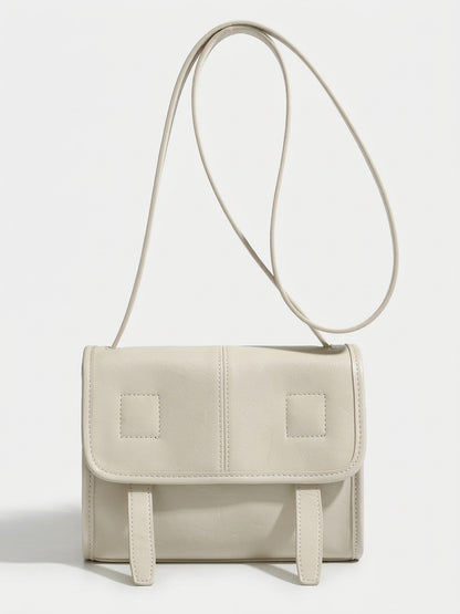 Borsa a spalla e tracolla minimalista in vera pelle testurizzata con patta