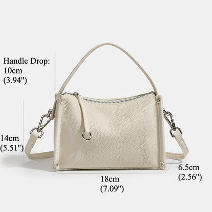 Pochette bandoulière épurée en cuir grainé véritable