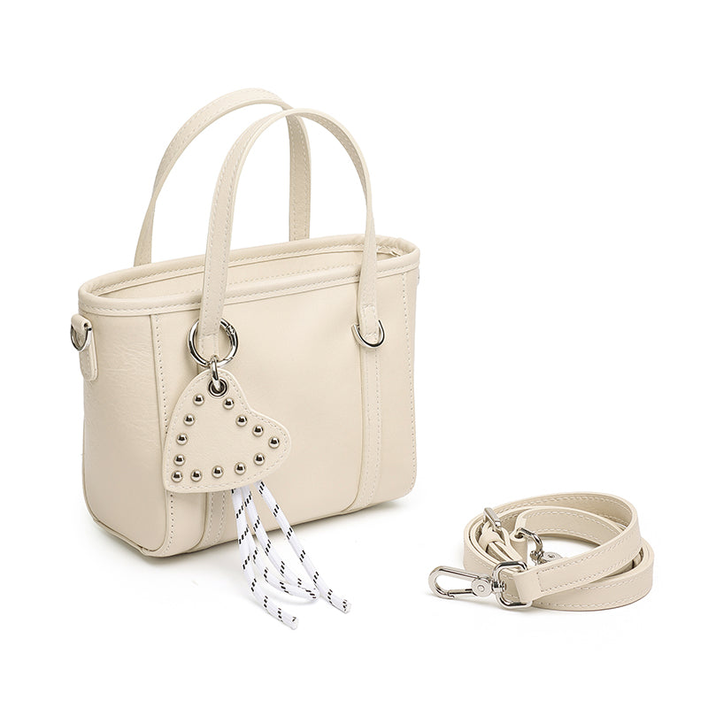 Mini tote a tracolla in vera pelle scolpita con distintivo cuore