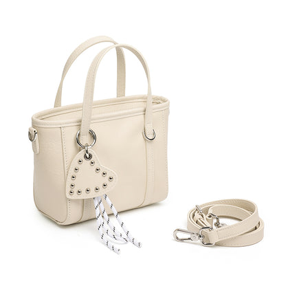 Mini tote a tracolla in vera pelle scolpita con distintivo cuore