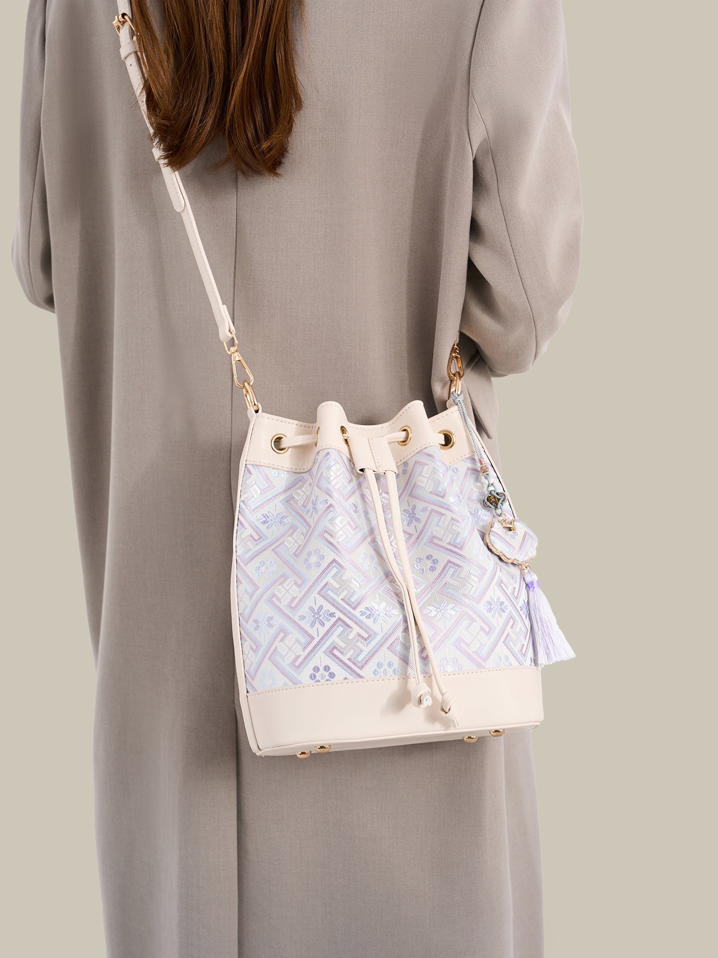 Gentle Oriental Brocade Vegan Eco-Leather Bucket Clutch Bag with Tassel Charm