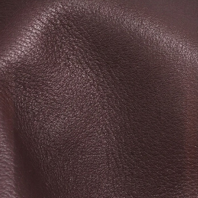 Minimalist Supple Genuine Leather Curved Clutch Bag with Playful Charm