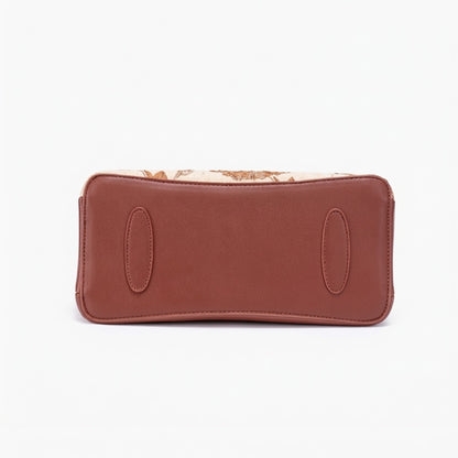 Borsa pochette floreale in ecopelle vegana, dal lusso discreto, con charm a foglia