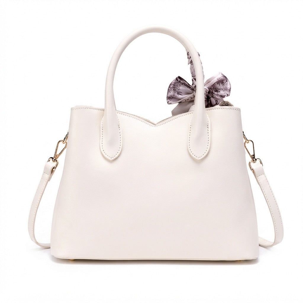 Borsa pochette floreale in jacquard di lusso discreto, in ecopelle vegana, con charm a foulard di seta