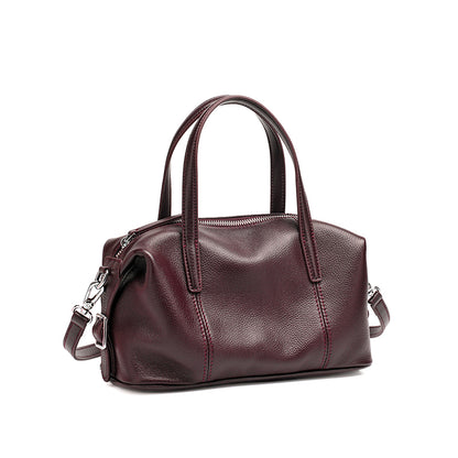 Borsa pochette a cuscino in vera pelle morbida dalla texture martellata