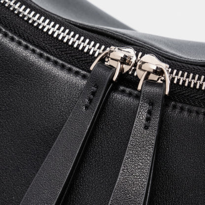 Borsa a tracolla a mezzaluna minimalista in vera pelle