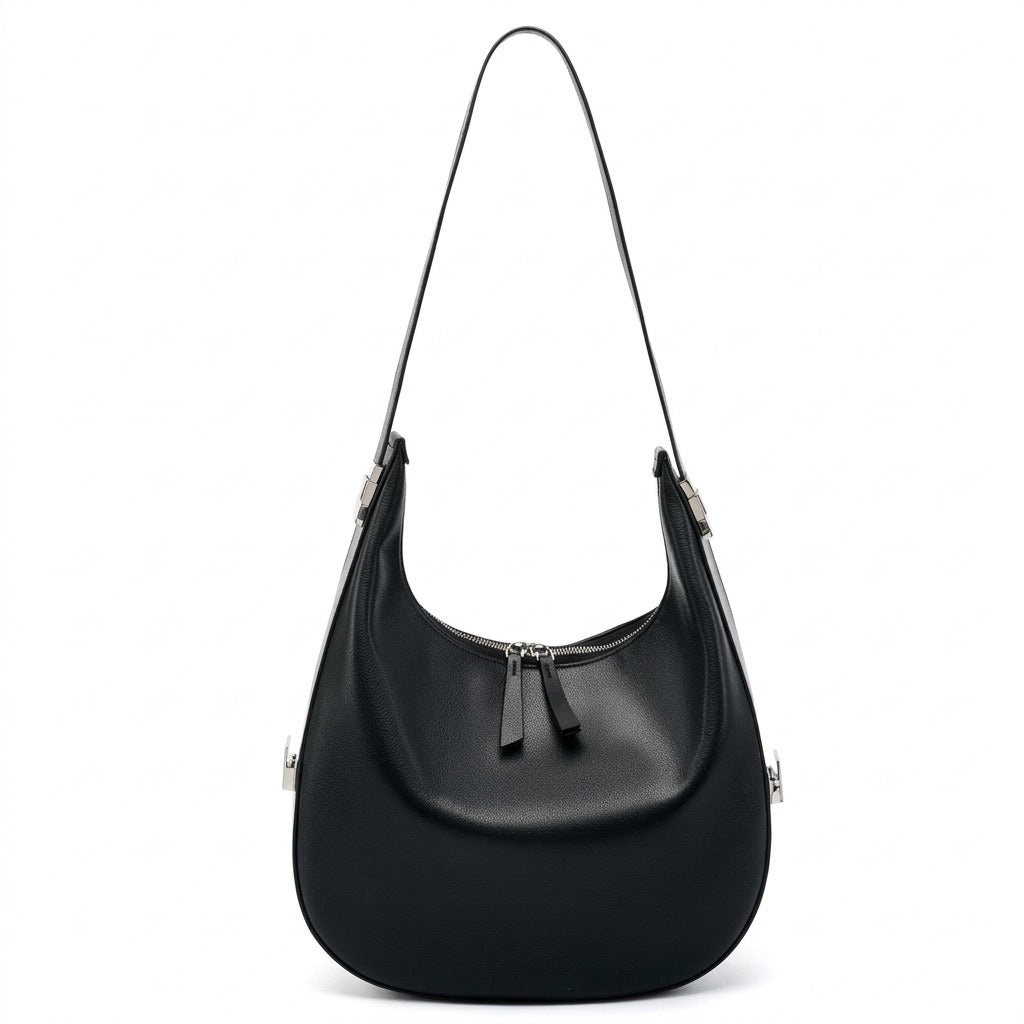 Borsa a tracolla a mezzaluna minimalista in vera pelle