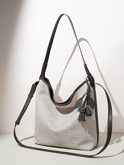 Slouchy Canvas Bucket Clutch Bag with Tassel Charm