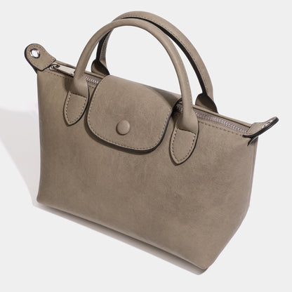 Heritage lässige Dumpling-Clutch aus echtem Leder