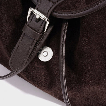 Mochila vintage de cuero genuino de ante con solapa y cordón
