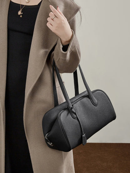 حقيبة مودرن إيست-ويست جلد طبيعي | حقيبة بولينغ بسيطة من جلد الحصى