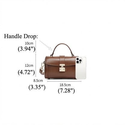 Bolso de mano tipo clutch cilíndrico de cuero genuino con estilo chic  