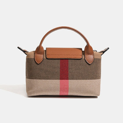 Bolso clutch bandolera de lona tejida con estampado clásico de cuadros británicos