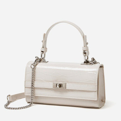 Bolso clutch sobre vintage de cuero genuino con acabado brillante tipo cocodrilo