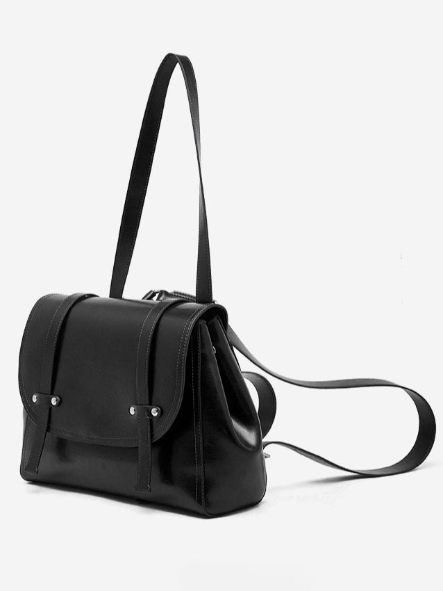 The Oil-Waxed Genuine Leather Convertible Flap Backpack Shoulder Bag