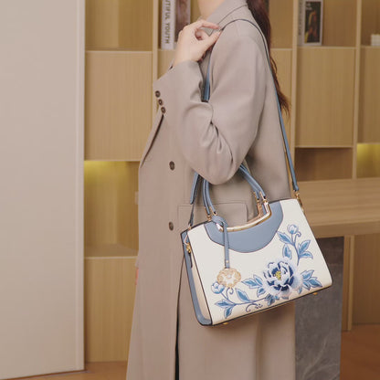 Elegant Peony Embroidered Vegan Eco-Leather Clutch Bag with Charm