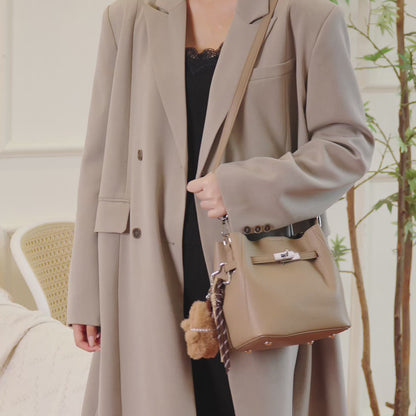 Mellow Pebble Textured Vegan Eco-Leather Bucket Bag with Fluffy Puppy Charm